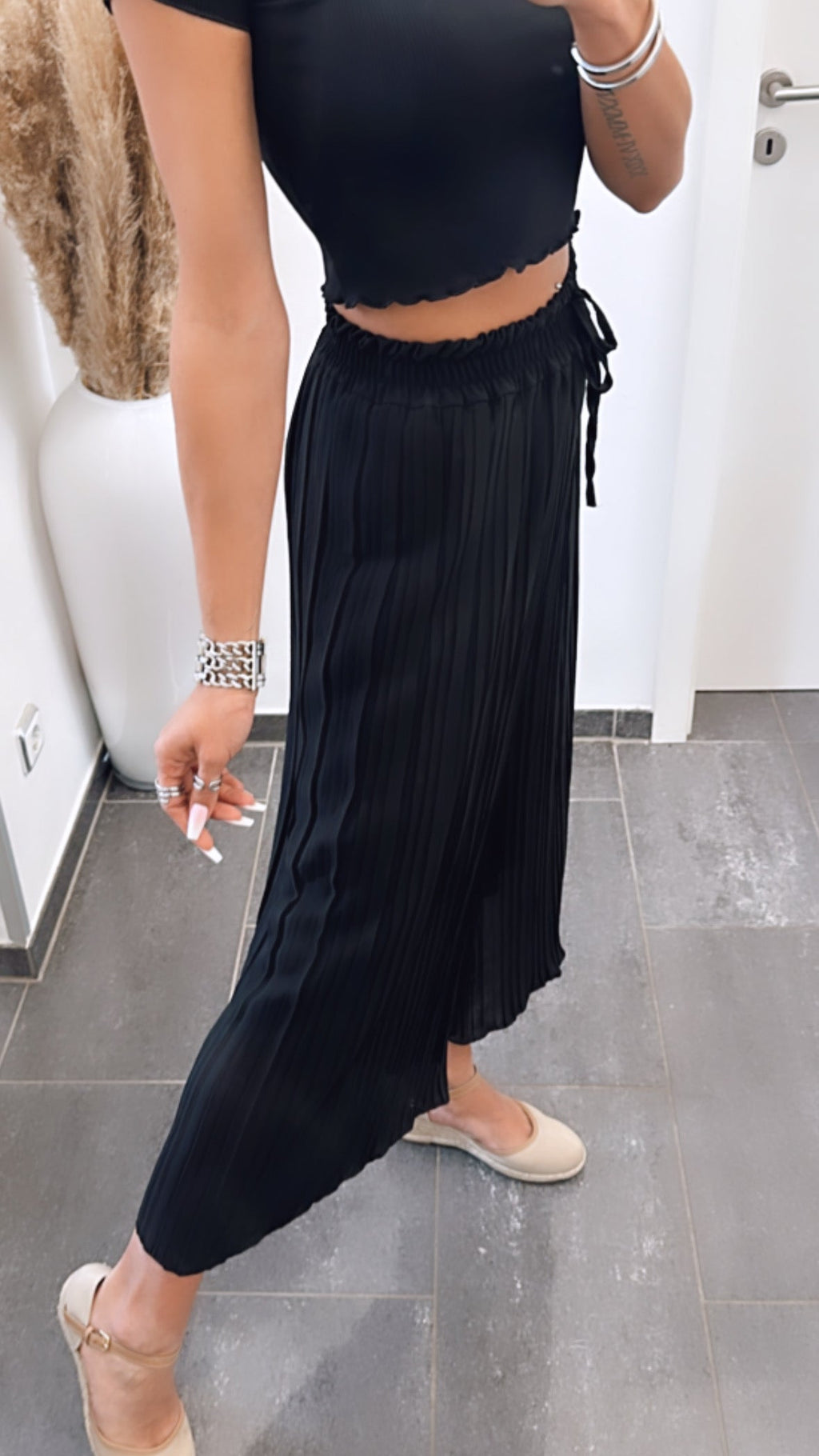Pantalones plisados negros