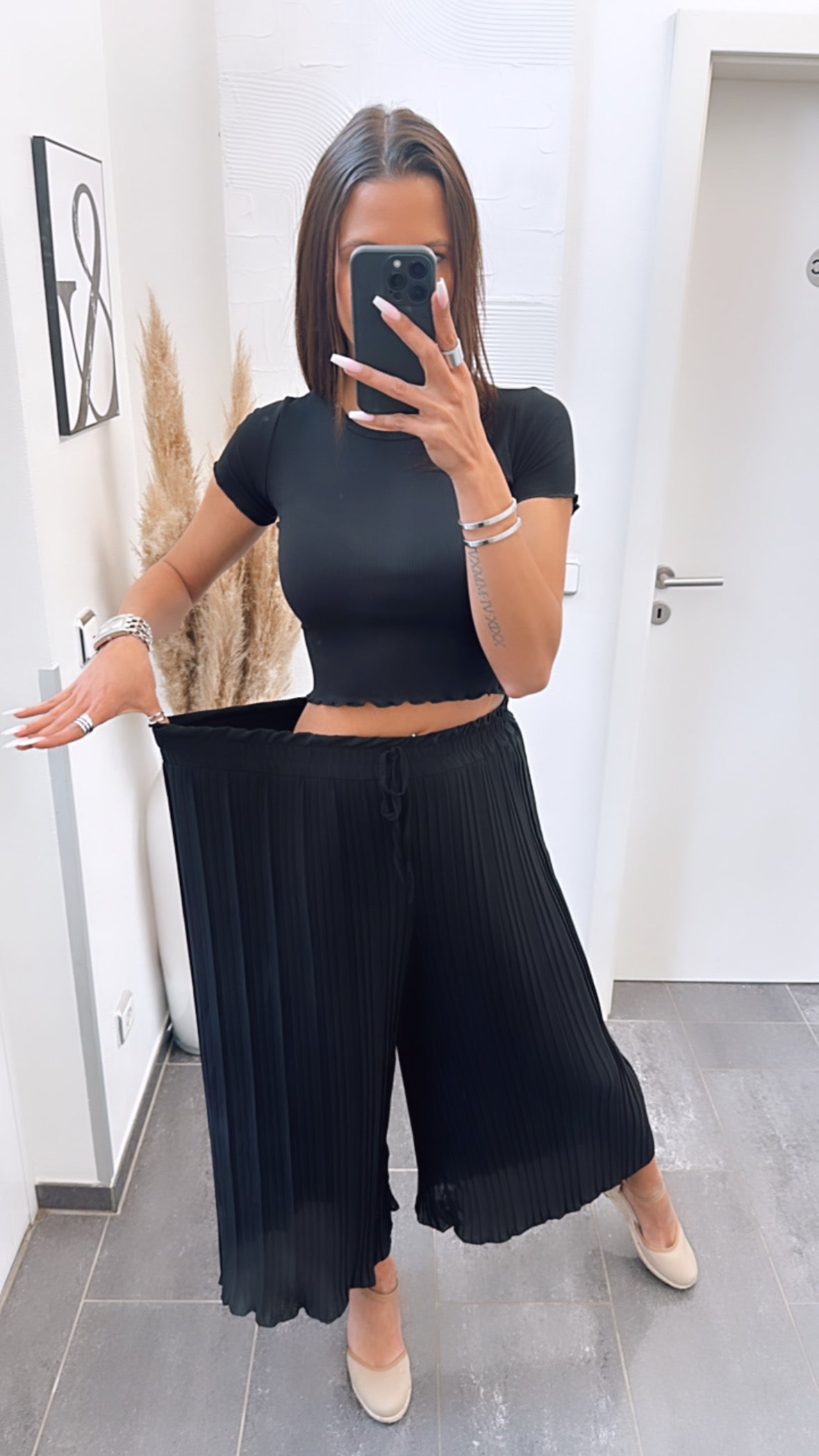 Pantalones plisados negros